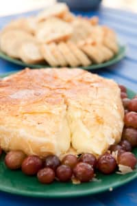 baked brie appetizer with grapes on a hells canyon rafting vacation