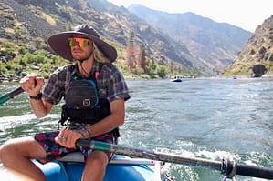 a hells canyon guide rows a boat on the snake river