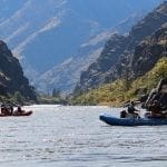 2 boats floating into the wilderness of hells canyon