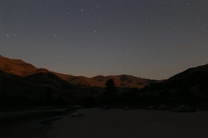 a starry night sky at camp in Hells Canyon while on a whitewater rafting trip