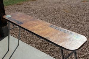 a camping river table sits in the sun drying