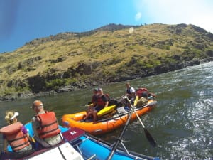view from a go pro of 2 rafts in the middle of a September Hells Canyon Rafting Trip